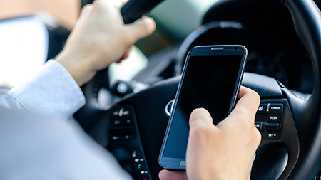 Distracted Driving Month Focuses on Seat Belts and Cell Phones